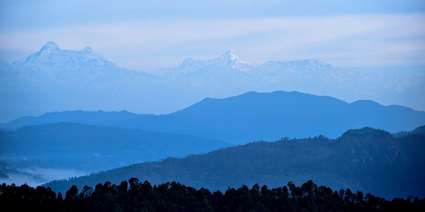 An image showing Sunset view over Mukteshwar, one of the places to visit near Bhimtal.