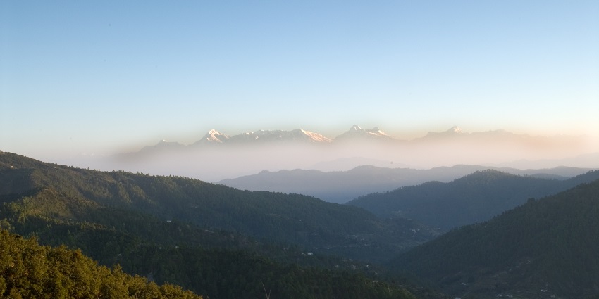 A surreal view of the Himalayas in Mukteshwar, an offbeat place near Nainital