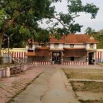 Inside view of the Nagercoil Temple showcasing the pathway and shrines of various gods.