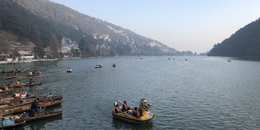 An image of Naini Lake with boats, one of the best hill stations near Lucknow.