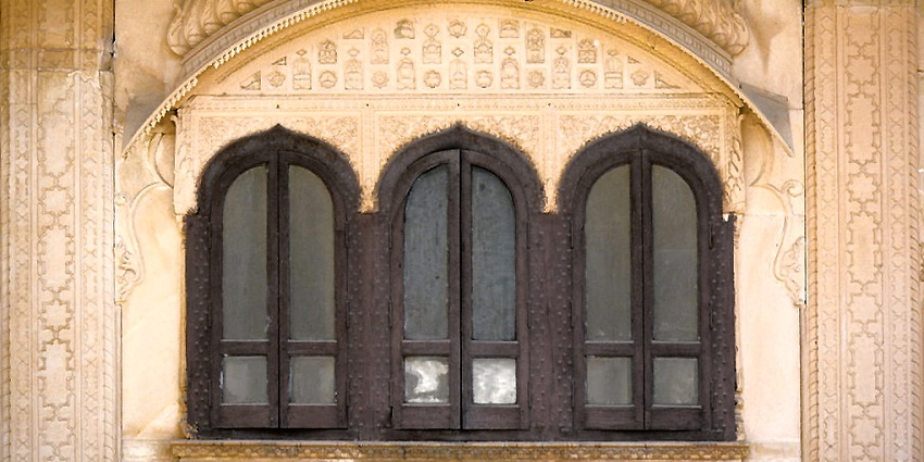 An image of the windows of Nand Bhawan showcasing historical architecture.