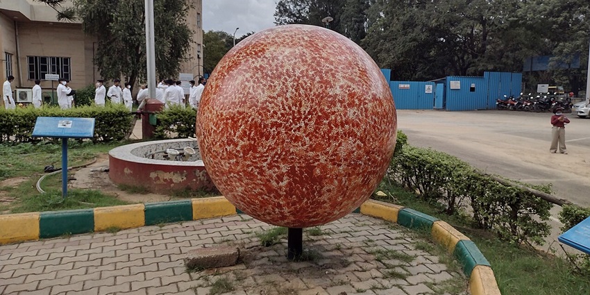 Interior view of the Jawaharlal Nehru Planetarium in Bangalore, showcasing exhibits.