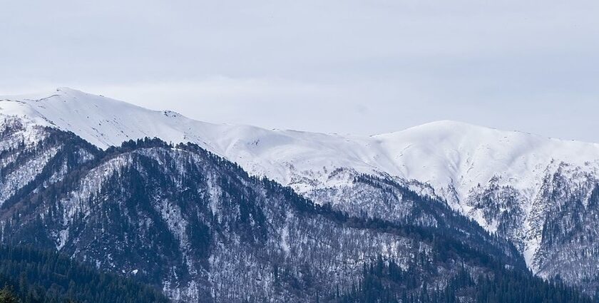 A picture of snow-covered mountains taken from Dehradun, Uttarakhand