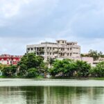 A beautiful view of the Burdwan Medical College, with a pond in front