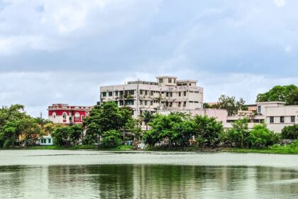 A beautiful view of the Burdwan Medical College, with a pond in front