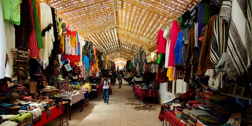 Shopping in Coimbatore for saree at traditional street known for fabrics, and bustling shops.