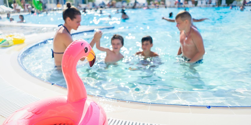An image of a family enjoying a waterpark, a perfect place for weekend fun.