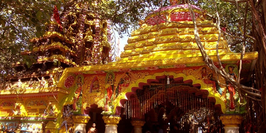 Gorakhnath Temple has intricate architecture surrounded by greenery and open space.