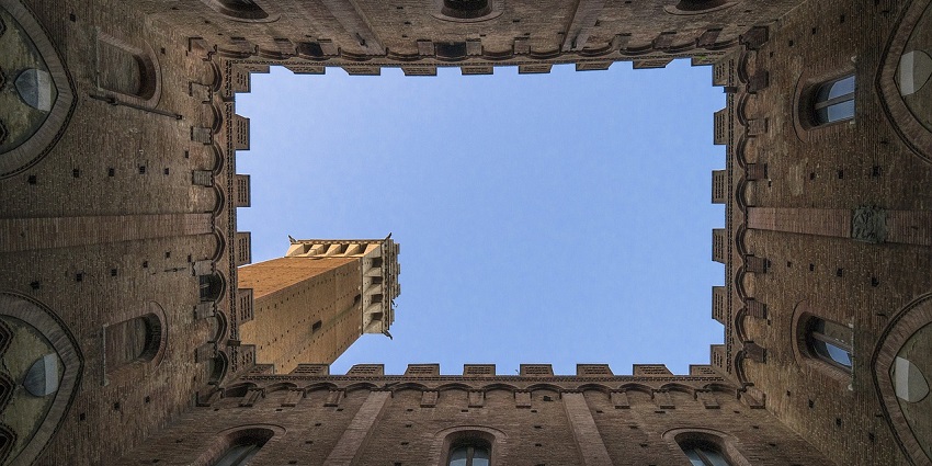 Historic fort with grand architecture, showcasing intricate stonework and tall towers.