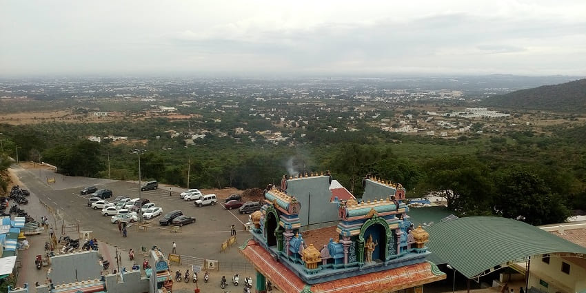 A picture of the Maruthamalai Temple with the view of Coimbatore city in the background