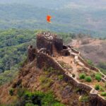 A vibrant view of the Padargad Fort, a tourist attraction in the Raigad district of Maharashtra.