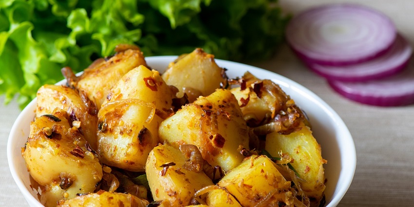 Spiced boiled potatoes with regional herbs and flavours.
