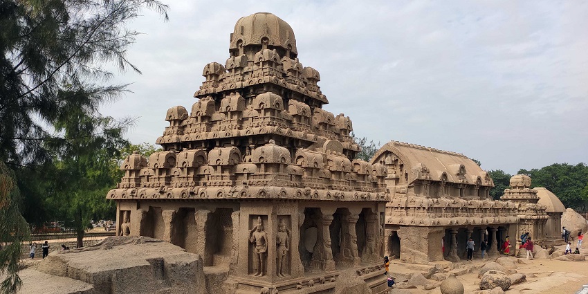 Five temples of the Pandavas are placed next to each other and people are visiting them