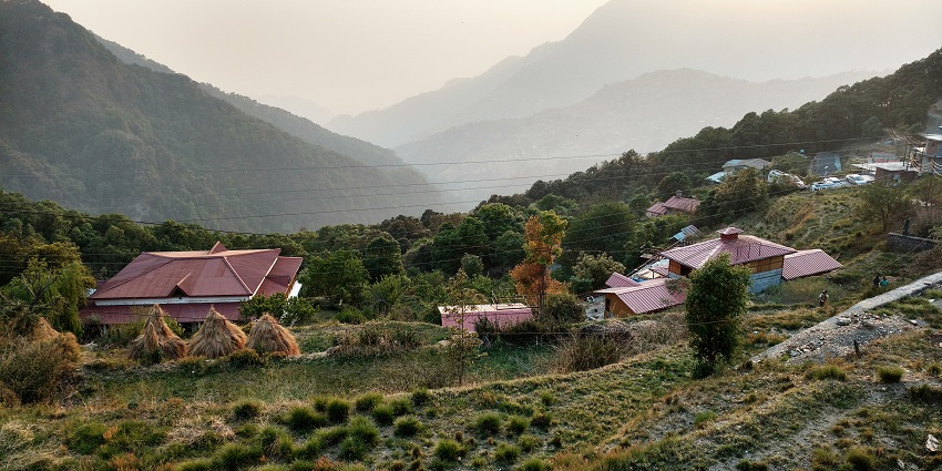 A panoramic view of green hills and lbreathtaking valleys in Pangot, Uttarakhand, India.