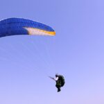 Paragliding in Dehradun, Uttarakhand, offers thrilling views of the Himalayas.