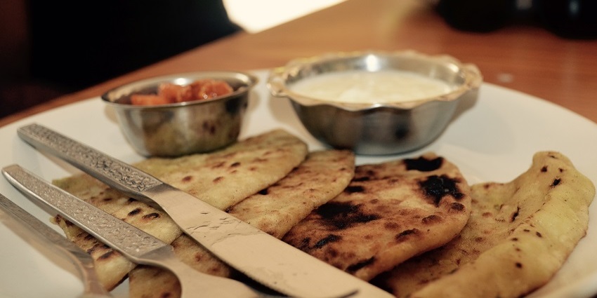 Aloo Parathas, served with curd and pickle, a popular local breakfast