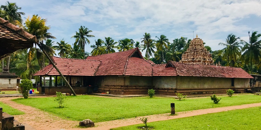 Parthasarathy Temple decorated with lights lit at night, highlighting the other structures.