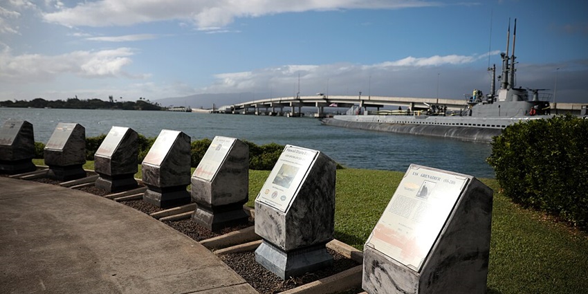 Pearl Harbor National Memorial with the submarine and highway in the background
