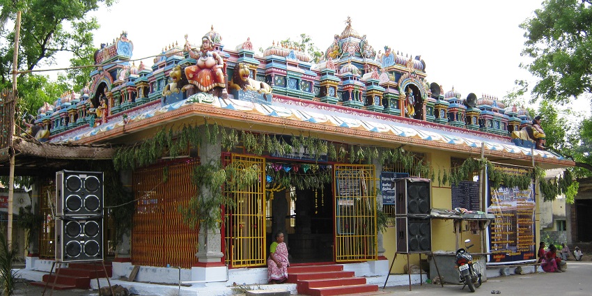 Vibrant and ornate stone carvings in Sri Periya Mariamman Temple from the outside.