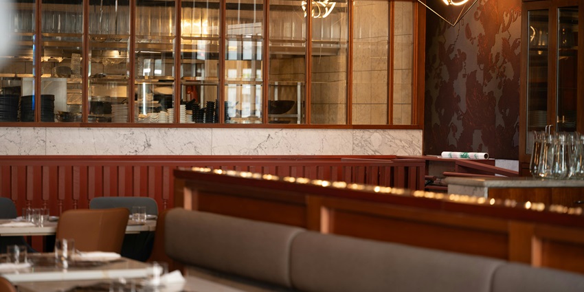 Upscale Vancouver restaurant interior with plush seating and warm nightlife in nainital