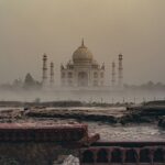 A panoramic view of the Taj Mahal from rooftops in Agra, Uttar Pradesh, India.