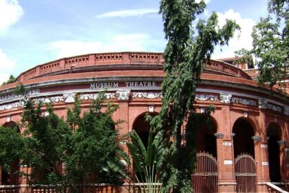 A panoramic view of Madras museum theatre with scenic background.