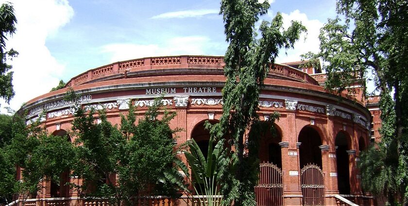 A panoramic view of Madras museum theatre with scenic background.