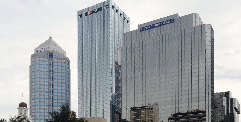 Florida city and traffic lights, tall reflective buildings with fifth-third bank signage