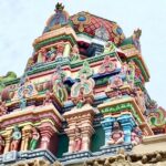 A panoramic view of the Srirangam Temple in Tamil Nadu, India, showing its ornate towers.