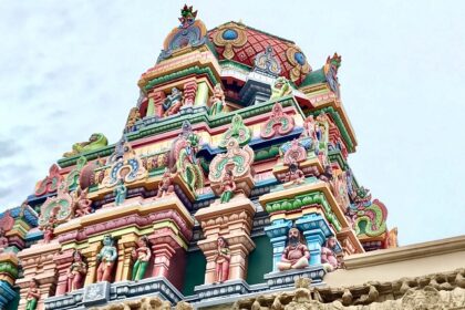 A panoramic view of the Srirangam Temple in Tamil Nadu, India, showing its ornate towers.