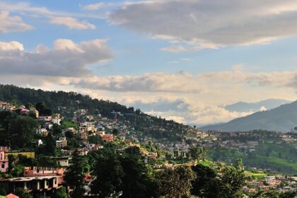 A beautiful evening over the Almora skyline, with vibrant orange hues lighting the sky.