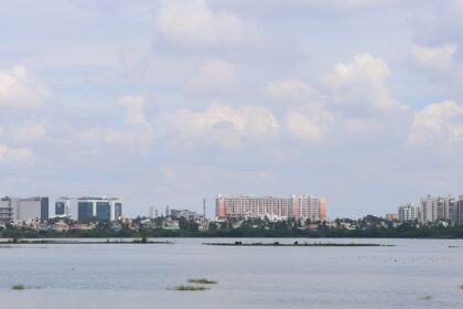 The Chennai skyline from St. Thomas Mount features urban buildings and dense greenery.