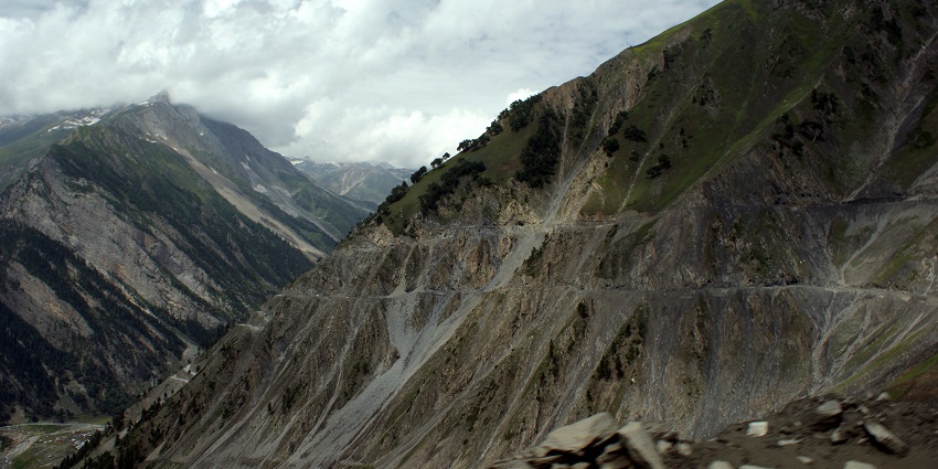 The view of a narrow road leading to Zoji La Pass (Zero Point) in Sonmarg