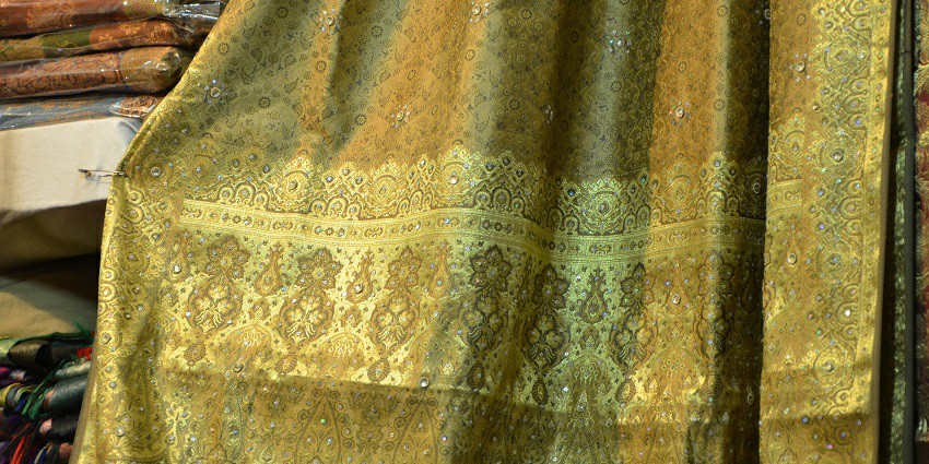 Close up image of a silk saree displayed at Pothys, ideal for functions or celebrations