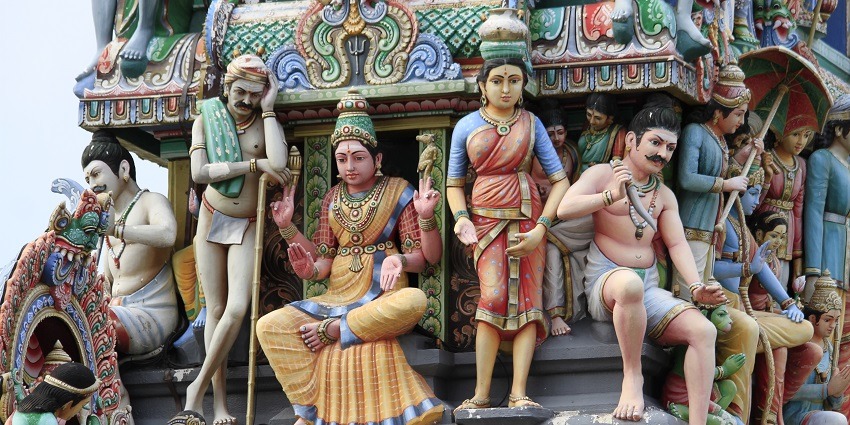 A close-up image of the goddess Mariamman statue located in a temple