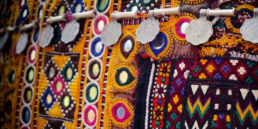 Shopping in Madurai market with handicrafts and textiles for travellers.