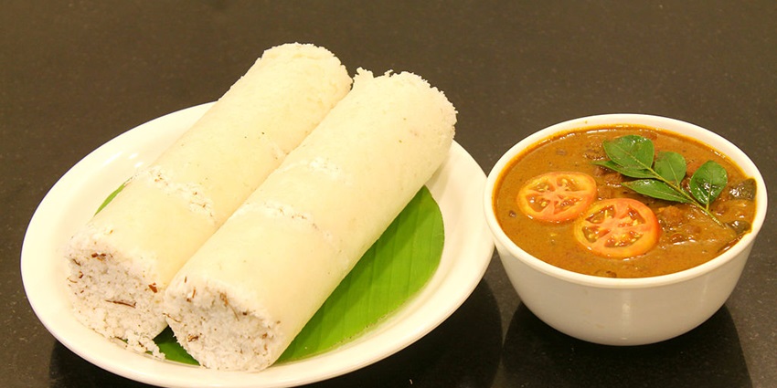 The famous food in Kanyakumari is Puttu, the steamed rice cake layered with coconut.