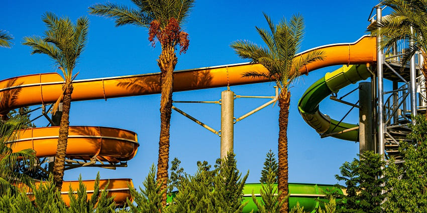 A large swimming pool with water slides at Queensland Amusement and Water Park.