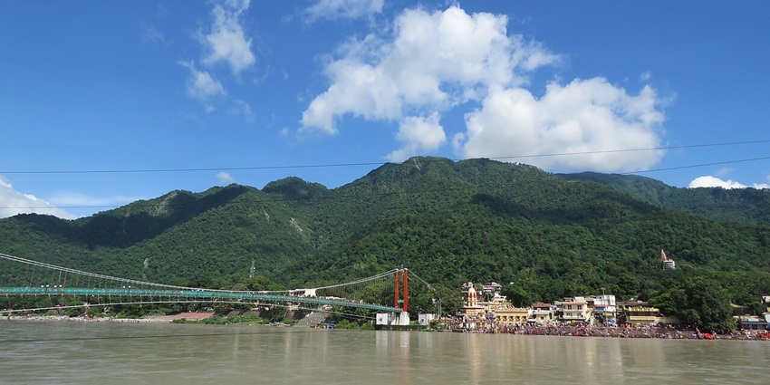 Scenic viewpoint offering breathtaking views of Ram Jhula Bridge.