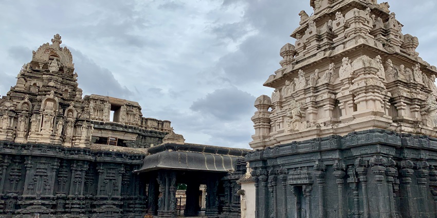 An outer view of various shrines in a temple complex which have stunning architecture.