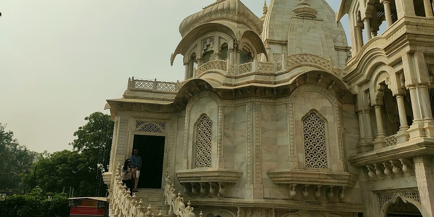 A View of a temple set against a mountain landscape, blending nature with architectural beauty.