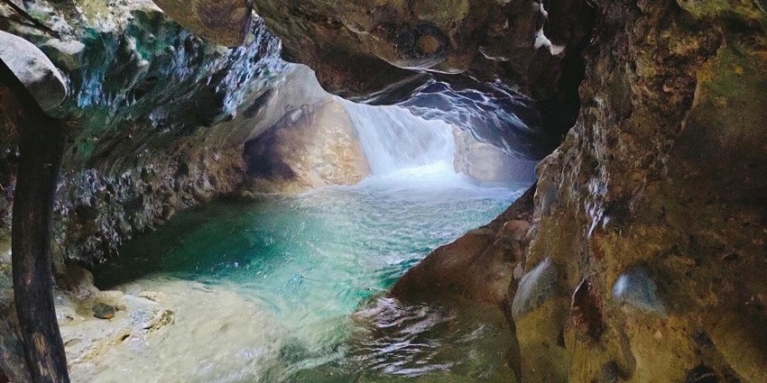 Robber’s cave is a scenic cave formation featuring a river and stunning landscapes.