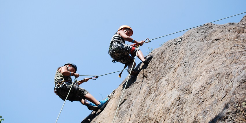 Image of two people rock climbing, one of the most thrilling adventure sports in Chennai