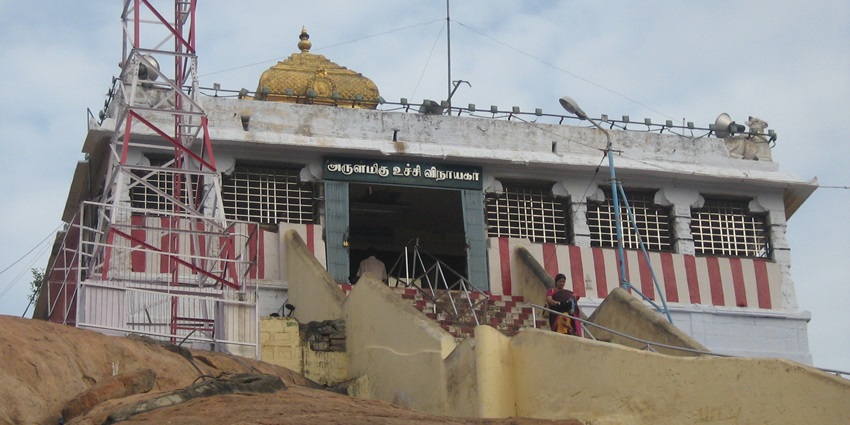Ucchi Pillayar Temple perched atop Rockford with stone steps and intricate carvings.