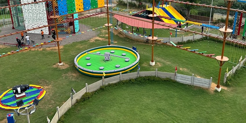 A picture of a famous adventure park in Rohtak with a trampoline and other activities on offer
