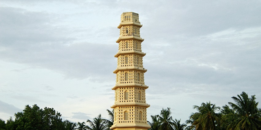 A picture of a tall tower located near the Sundarbans common for birdwatchers