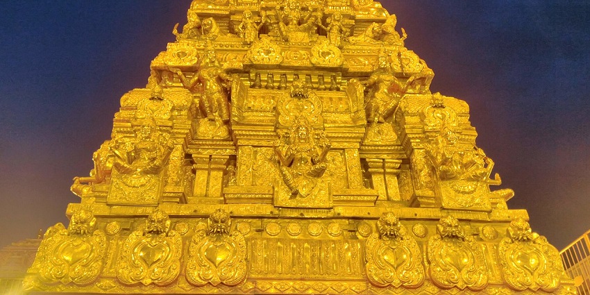 The entrance is carved with the gold of Goddess Mariamman in Samayapuram Temple.