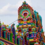 A front view of the Samayapuram Mariyamman Temple, showcasing its architectural design.