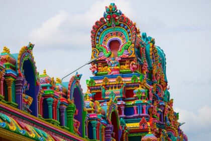 A front view of the Samayapuram Mariyamman Temple, showcasing its architectural design.