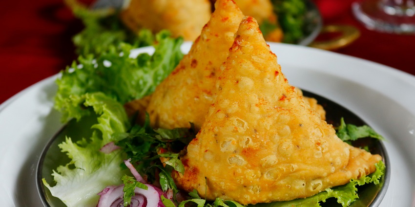 Savour the delicious and crunchy samosa - the best food in Vrindavan, Uttar Pradesh.
